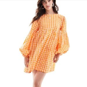 ASOS DESIGN mini textured smock dress in orange and pink gingham